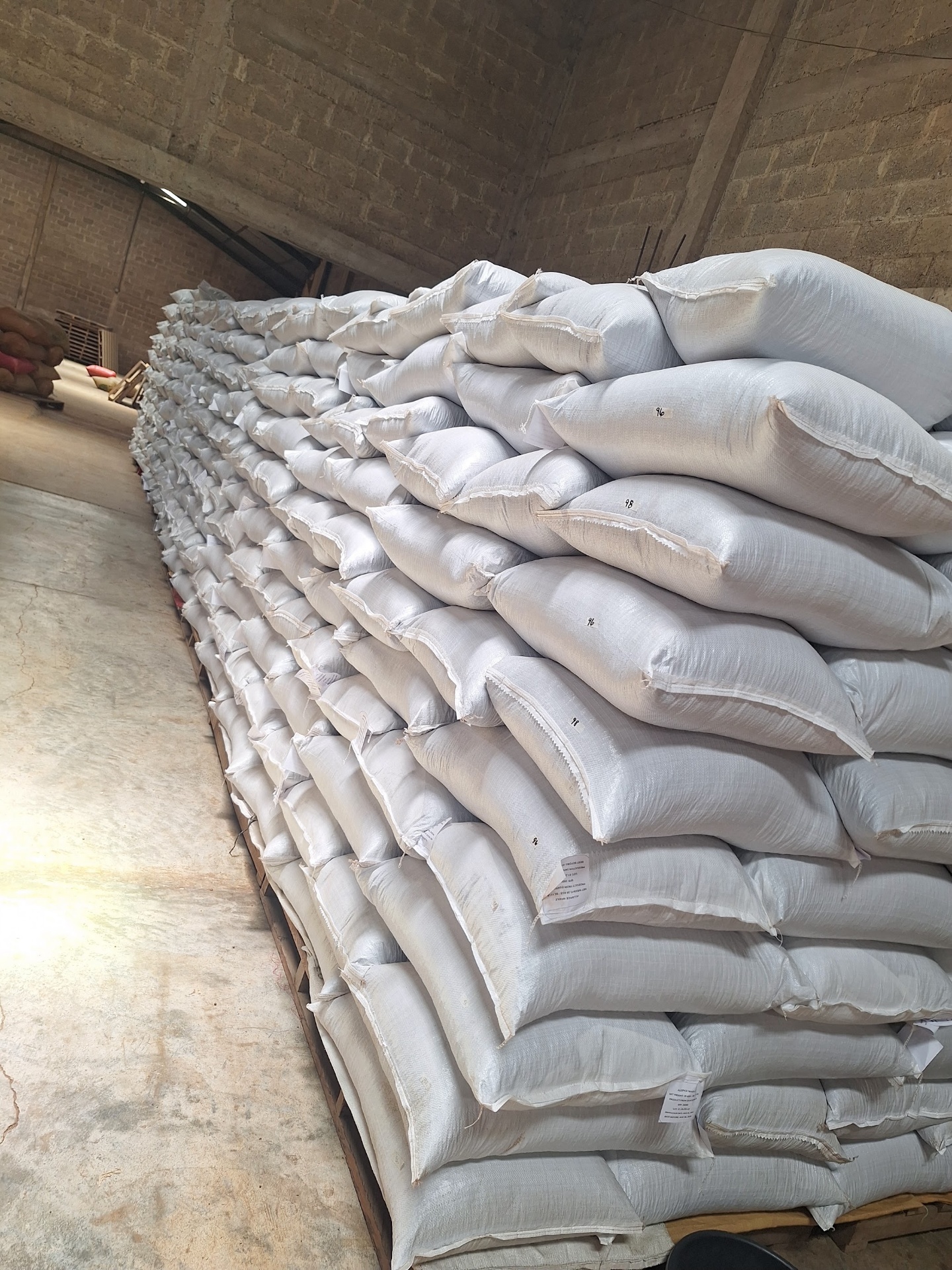 Warehouse with stacked allspice sacks