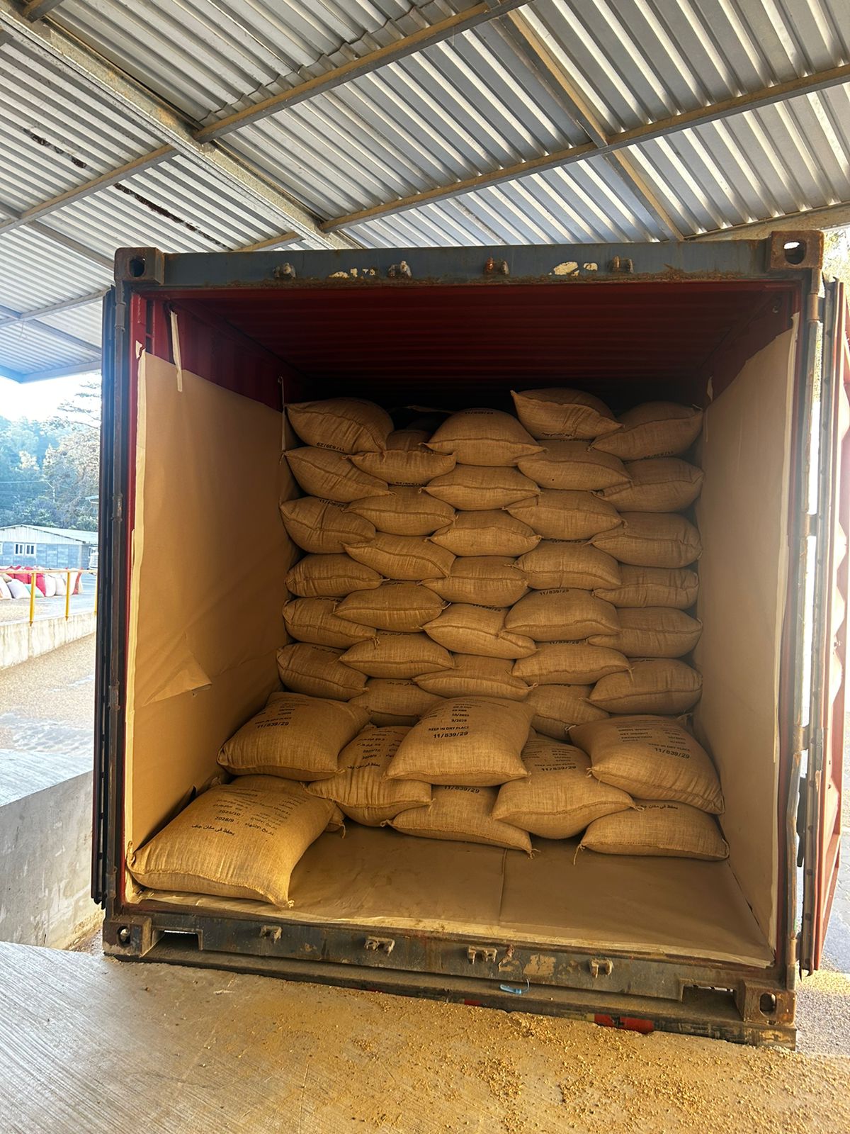 Sacks stacked inside the container